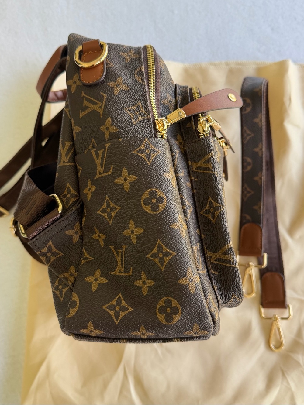 Brown Fashion Multi Pocket Mini
Backpack with Gold Hardware and Faux leather - Picture 5 of 8